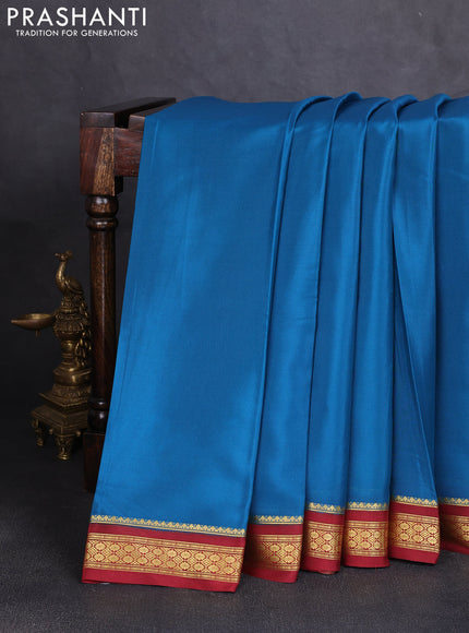 Pure mysore silk saree cs blue and rust shade with plain body and zari woven border