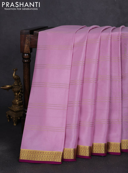 Pure mysore silk saree lotus pink and purple with allover zari stripe pattern and zari woven border