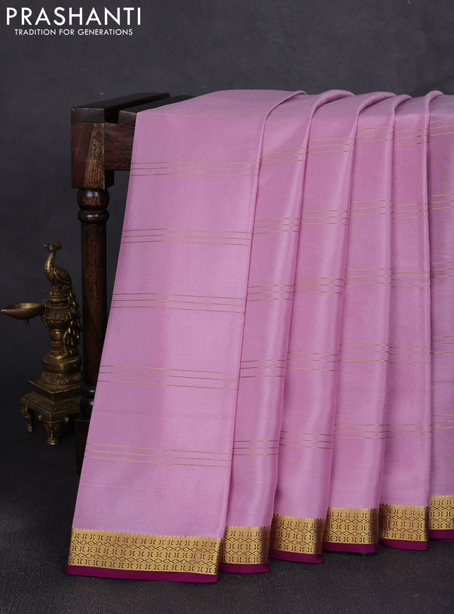 Pure mysore silk saree lotus pink and purple with allover zari stripe pattern and zari woven border