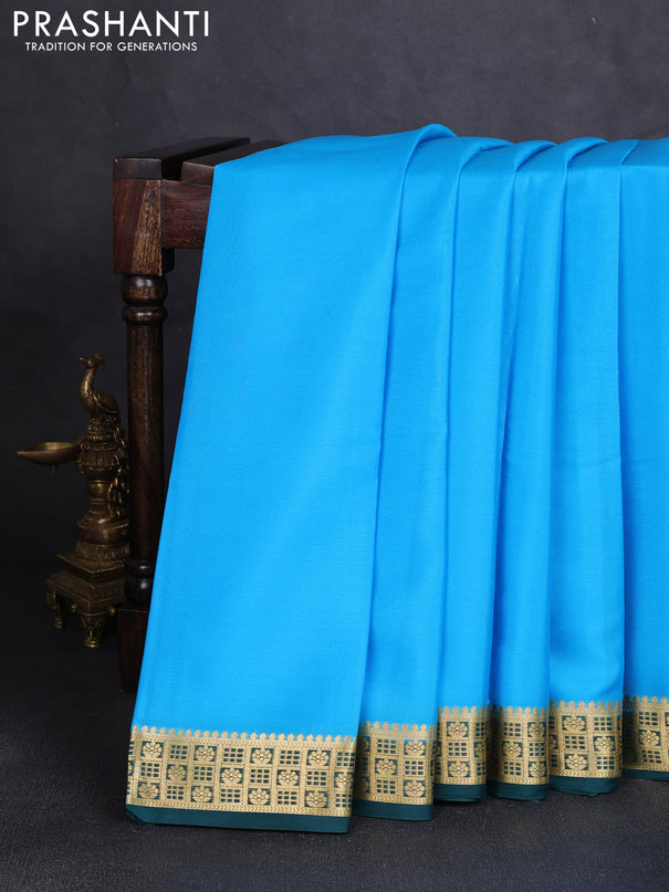 Pure mysore silk saree teal blue and bottle green with plain body and zari woven border