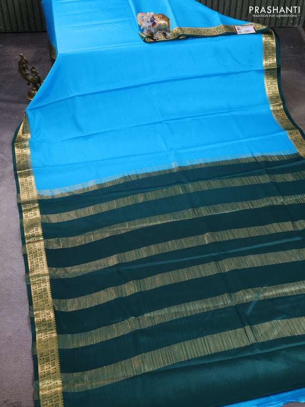 Pure mysore silk saree teal blue and bottle green with plain body and zari woven border