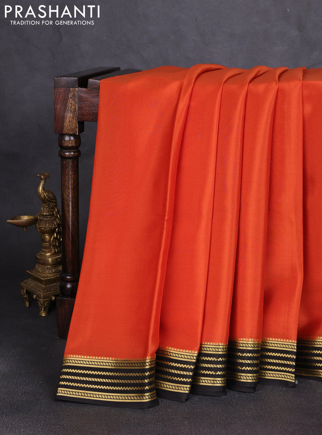 Pure mysore silk saree rust shade and coffee brown with plain body and zari woven border