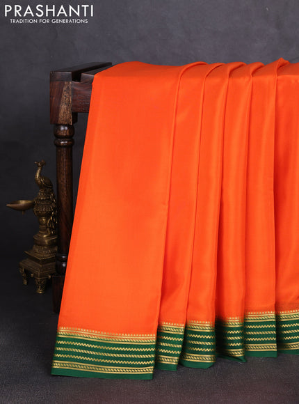 Pure mysore silk saree orange and green with plain body and zari woven border