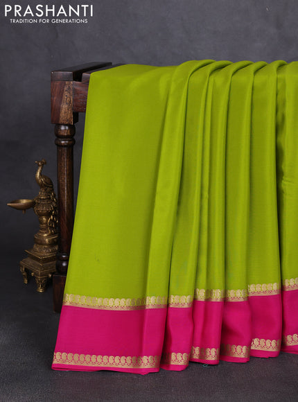 Pure mysore silk saree light green and pink with plain body and rettapet zari woven border