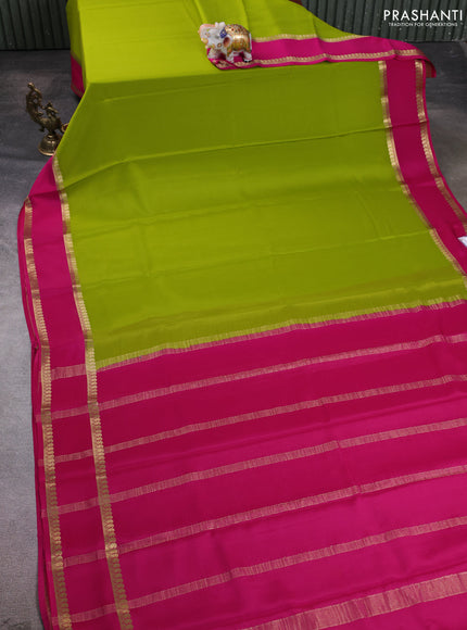 Pure mysore silk saree light green and pink with plain body and rettapet zari woven border
