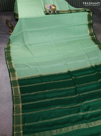 Pure mysore silk saree pista green and bottle green with plain body and zari woven border