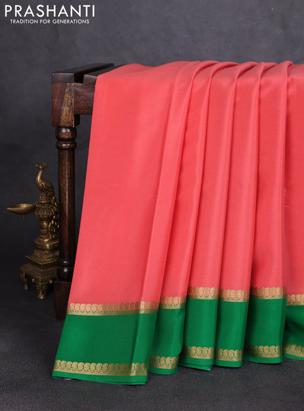 Pure mysore silk saree peach shade and green with plain body and rettapet zari woven border