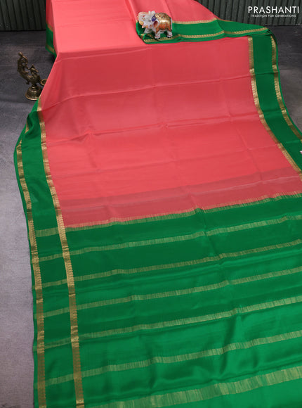 Pure mysore silk saree peach shade and green with plain body and rettapet zari woven border