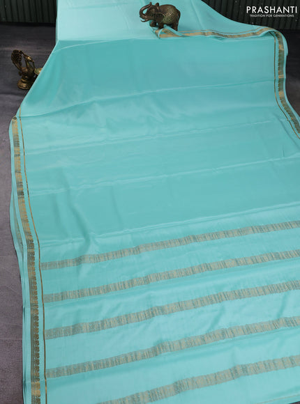 Pure mysore silk saree teal green with plain body and elephant zari woven border