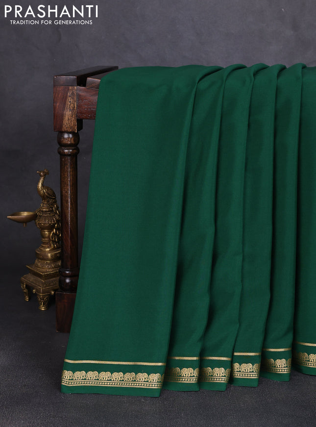 Pure mysore silk saree green with plain body and elephant zari woven border