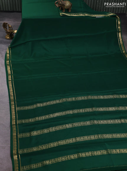 Pure mysore silk saree green with plain body and elephant zari woven border