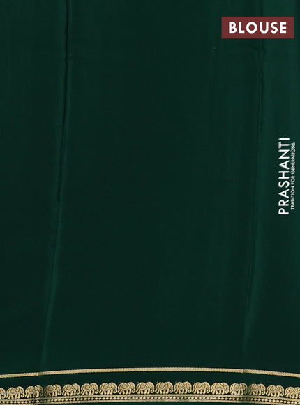 Pure mysore silk saree green with plain body and elephant zari woven border