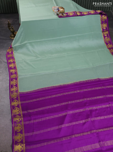 Pure mysore silk saree pastel green and purple with plain body and zari woven butta border