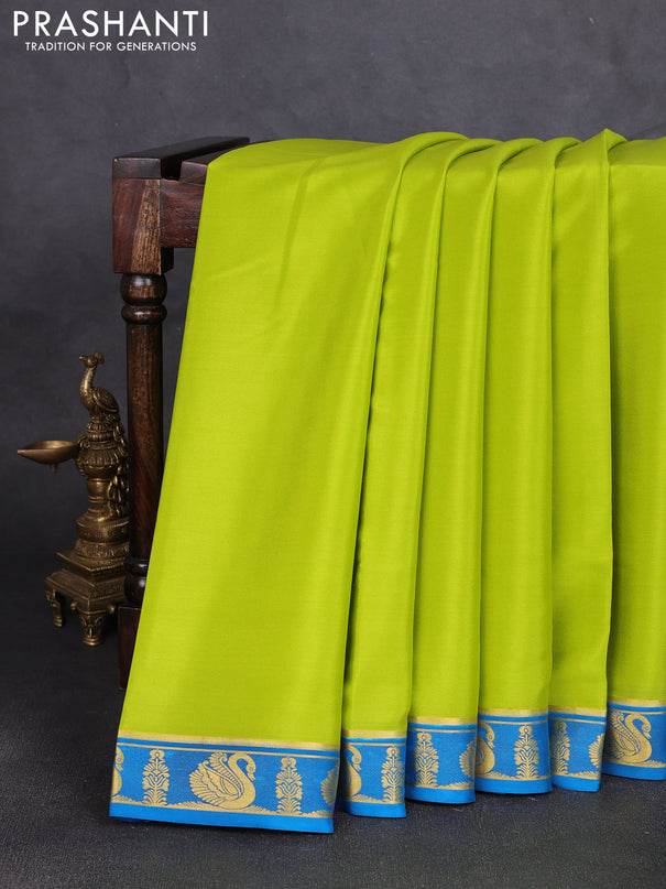 Pure mysore silk saree light green and teal blue with plain body and zari woven butta border
