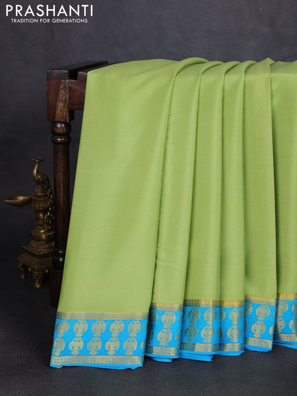Pure mysore silk saree pista green and teal blue with plain body and zari woven butta border