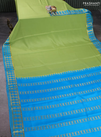 Pure mysore silk saree pista green and teal blue with plain body and zari woven butta border