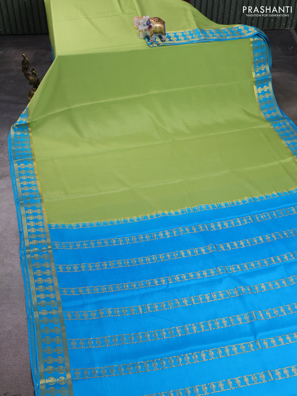 Pure mysore silk saree pista green and teal blue with plain body and zari woven butta border