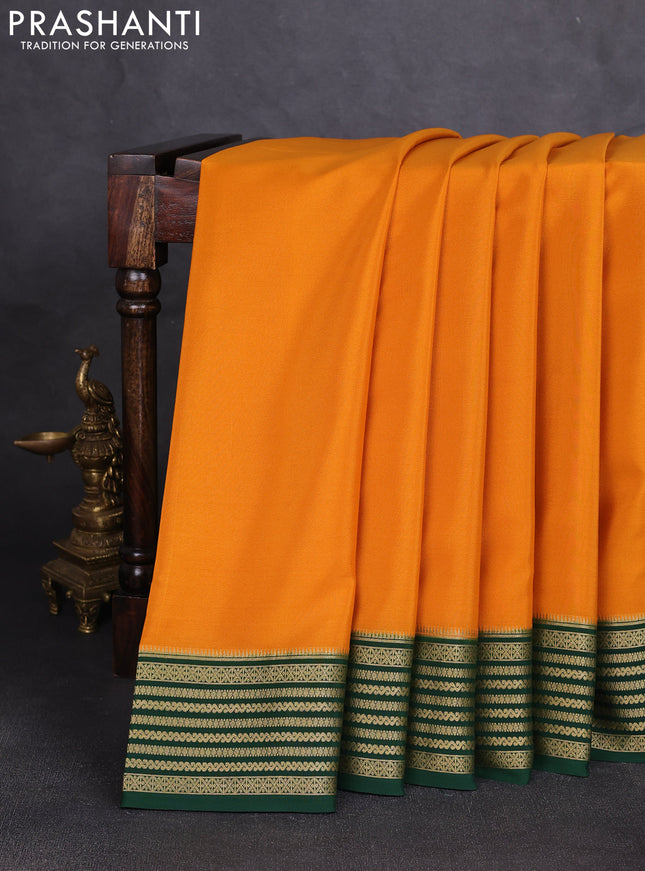 Pure mysore silk saree dark mustard and bottle green with plain body and zari woven border