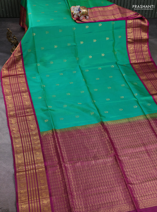 Pure soft silk saree teal green and purple with zari woven buttas and zari woven border