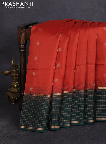 Pure soft silk saree rust shade and bottle green with zari woven buttas and zari woven checked border