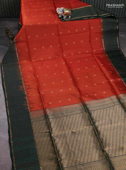 Pure soft silk saree rust shade and bottle green with zari woven buttas and zari woven checked border