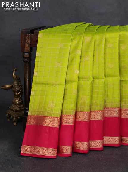 Pure soft silk saree light green and pink with allover zari checks & buttas and rettapet zari woven border