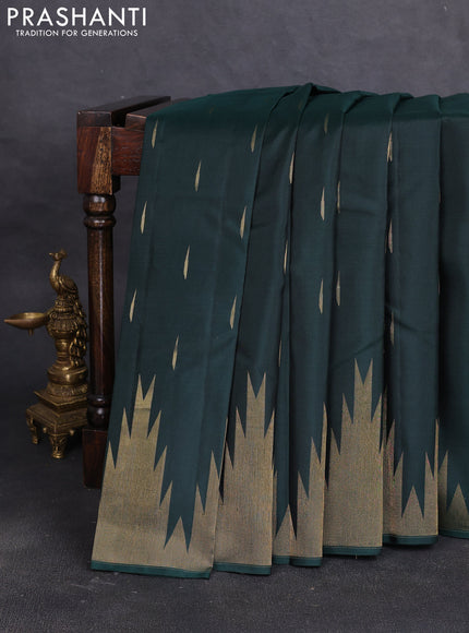 Pure soft silk saree bottle green with allover zari woven buttas and temple design zari woven border