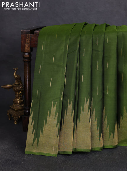 Pure soft silk saree mehendi green with allover zari woven buttas and temple design zari woven border