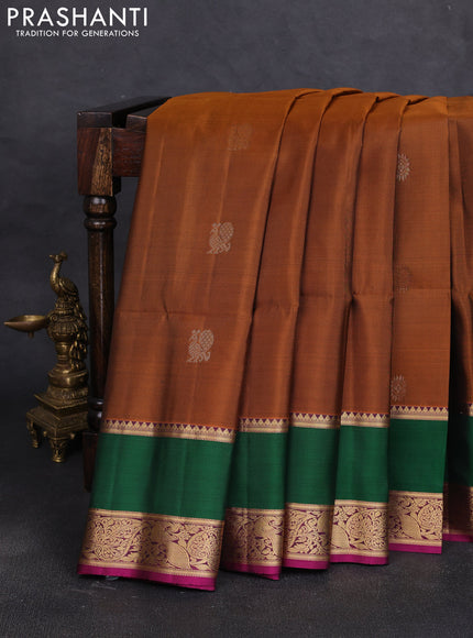 Pure soft silk saree dark mustard and magenta pink with zari woven buttas and rettapet zari woven border