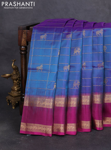 Pure soft silk saree dual shade of blue and dark magenta pink with allover zari checked & buttas and rettapet zari woven border