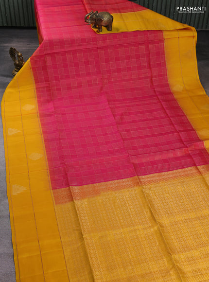 Pure soft silk saree pink and yellow with allover zari woven checked pattern and long zari woven border