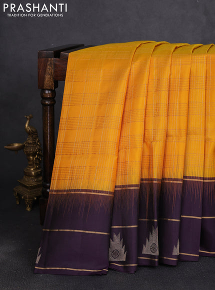 Pure soft silk saree mango yellow and purple with allover zari woven checked pattern and long zari woven border