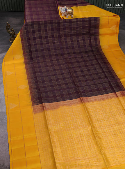 Pure soft silk saree deep wine and yellow with allover zari checked pattern and temple zari woven border