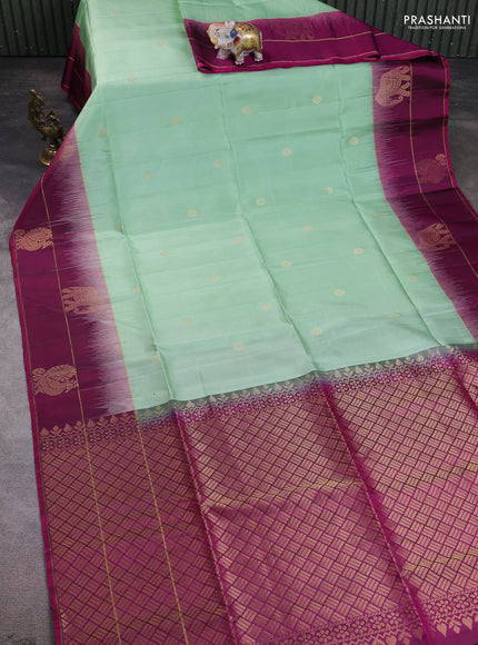 Pure soft silk saree pastel green and purple with zari woven buttas and zari woven simple border