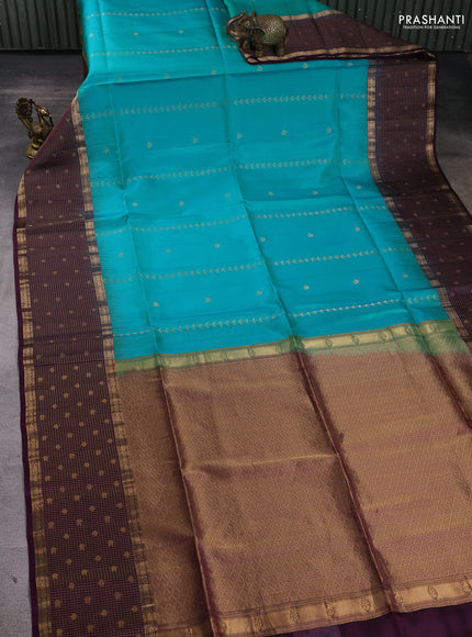 Pure soft silk saree teal blue and purple with zari woven buttas and zari checked butta border
