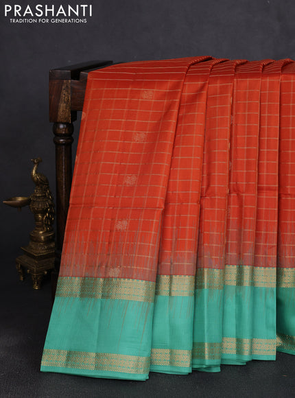 Pure soft silk saree orange and teal green with allover zari checks & buttas and rettapet zari woven border