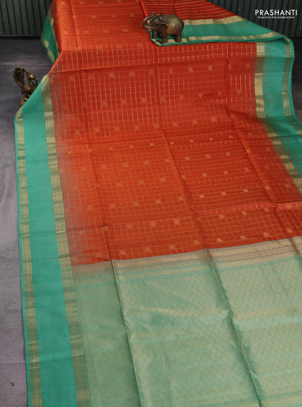Pure soft silk saree orange and teal green with allover zari checks & buttas and rettapet zari woven border