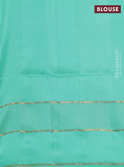 Pure soft silk saree purple and teal green shade with allover zari woven buttas and long zari woven butta border