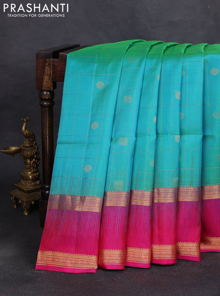 Pure soft silk saree dual shade of teal blue and pink with allover zari checks & buttas and rettapet zari woven border