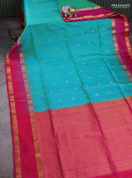 Pure soft silk saree dual shade of teal blue and pink with allover zari checks & buttas and rettapet zari woven border
