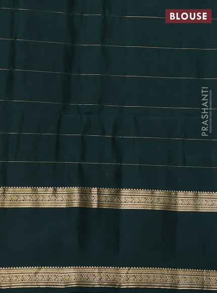 Pure soft silk saree orange and bottle green with allover zari checks & buttas and rettapet zari woven border