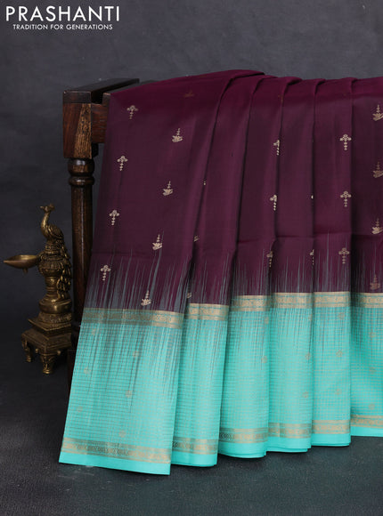 Pure soft silk saree wine shade and teal green with allover zari woven buttas and long zari woven checked butta border
