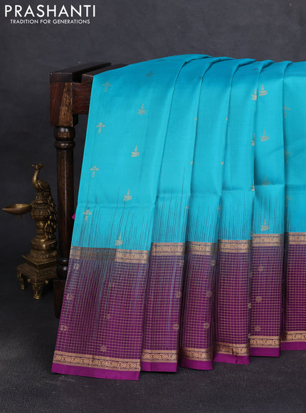 Pure soft silk saree teal blue and purple with allover zari woven buttas and long zari woven checked butta border