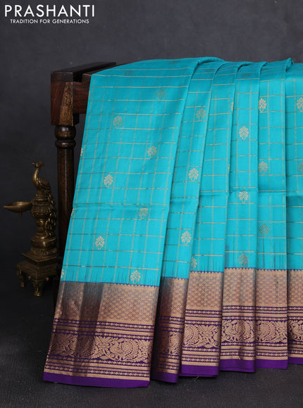 Pure soft silk saree teal blue and violet with allover zari checks & buttas and zari woven border