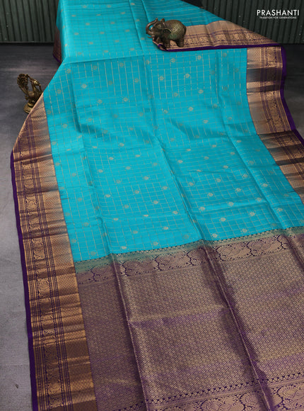 Pure soft silk saree teal blue and violet with allover zari checks & buttas and zari woven border