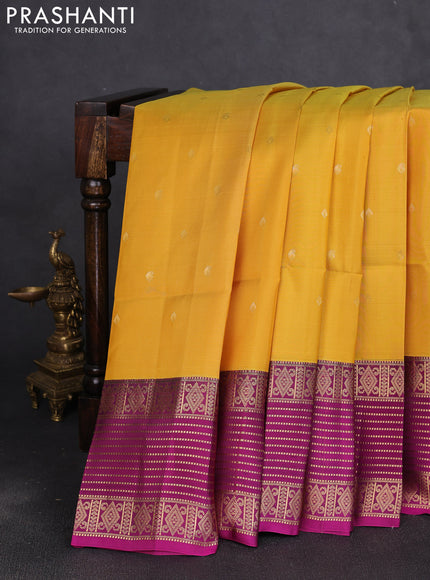 Pure soft silk saree yellow and purple with allover zari woven buttas and zari woven border