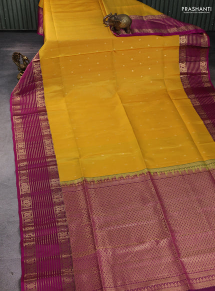 Pure soft silk saree yellow and purple with allover zari woven buttas and zari woven border