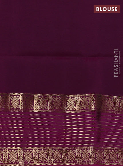 Pure soft silk saree green and dark magenta pink with allover zari woven buttas and zari woven border