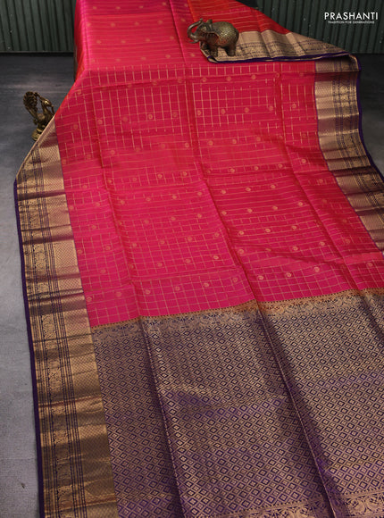 Pure soft silk saree dual shade of pinkish orange and blue with allover zari checks & buttas and long zari woven border