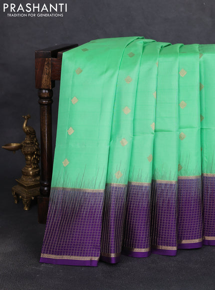 Pure soft silk saree teal green and violet with zari woven buttas and long zari woven checked border